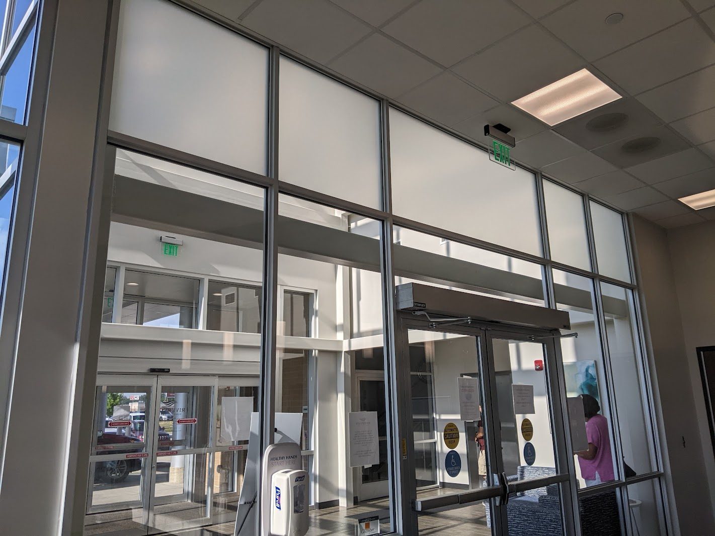 Glass partition wall and entry inside a commercial lobby