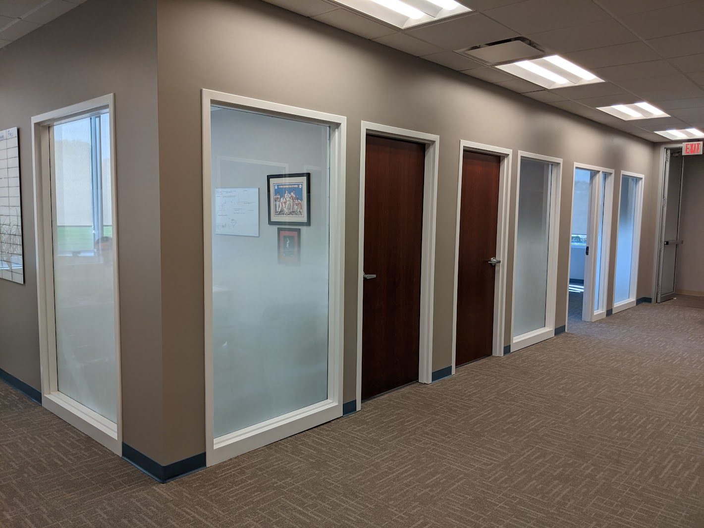 Office hallway with frosted glass sidelites